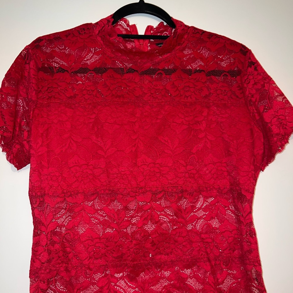 Guess red shirt short sleeve dressy shirt. See thru material. Size XL